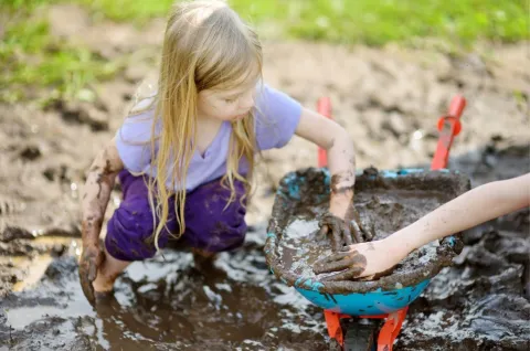 Children Playing in Mud