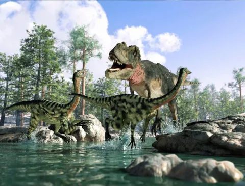 Group of dinosaurs near stream