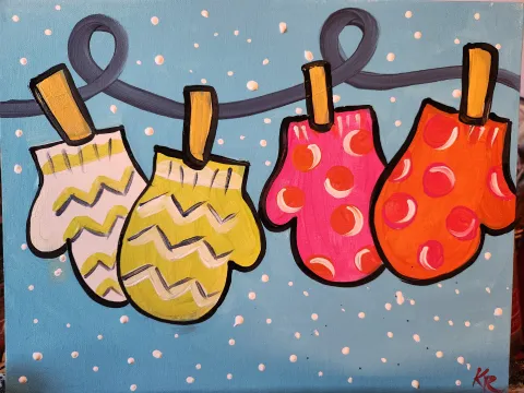 Mittens hanging on line to dry