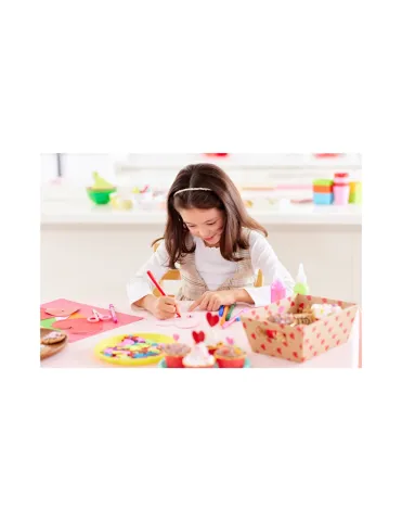 Child making Valentine crafts