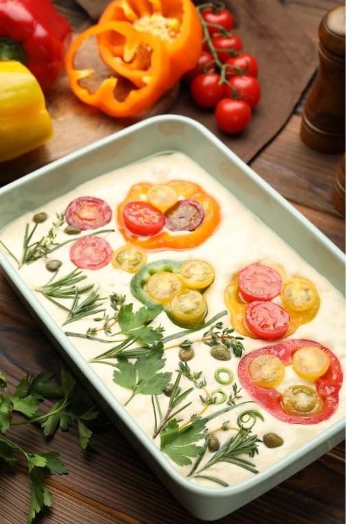 Focaccia decorated with vegetables